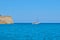 Small tourist motor boat in the Aegean Sea, near the Greek island of Spinalonga