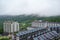 Small town mountain village in foggy with view of mountains and resort lodge apartment condo architecture building