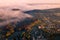 Small town village during the sunrise with fog. surrounded by hills in lower austria. Aerial drone photo