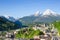 Small township Berchtesgaden and snowy peaks of Watzmann mountain