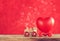 small toy steam locomotive carries heart, valentines day composition