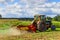 Small tractor working in the field. smallholder agriculture.