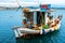 Small traditional fishing boat, floating in the Mediteranean sea