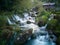 Small traditional wooden water mill by the wild river Krupa with big rocks and cascades on popular tourist place Krupa na Vrbasu