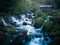 Small traditional wooden water mill by the wild river Krupa with big rocks and cascades on popular tourist place Krupa na Vrbasu