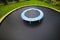 Small trampoline on big one with round mat, size comparison