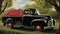 a small truck loaded with glossy, dark cherries, carefully stacked for transport.