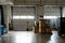 Small truck loading bay terminals seen from inside small factory with pallet loader in front