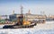 Small tug boat goes on icy channel