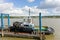 A small tug-boat tied at a jetty in vancouver