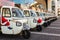 Small TukTuk Grocery Store Home Delivery Vehicles lined up at a supermarket