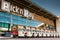 Small TukTuk Grocery Store Home Delivery Vehicles lined up at a supermarket