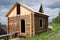 Small unfinished wooden timber home