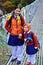 Small unidentified children go home from school in Phakding, Nepal