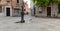 A small urban fountain in venice and thirsty seagull gull