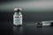 Small vaccine bottle phial with a label that read `Covid - 19 Corona virus Vaccine injection only`