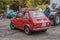 Small veteran old red car Polski Fiat 126p af a car show