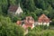 Small village with church in the countryside at the foot of the town of Rothenburg in Germany