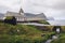 Small village church on the sea shore in Vidareidi, Faroe Islands, Denmark