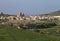 A small village with a large domed church in the countryside on Gozo, Malta