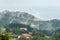 Small village near a foggy mountainside forest in Bizkaia, Basque Country