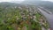 Small village town aerial shot, misty fog, river mountains air