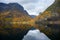 Small village on the waterfront and mountains in the autumn season at Flam in Norway