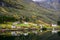 Small village on the waterfront and mountains in the autumn season at Gudvangen to Flam in Norway