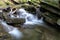 Small waterfal with stones, long exposure