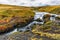 Small waterfall above Skogafoss in Skogar, Iceland