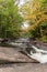 Small waterfall in Arrowhead Park. Indian Summer. Canada