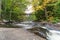 Small waterfall in Arrowhead Park. Indian Summer. Canada