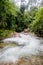 Small waterfall with cryatal clear water stream near the campground on the way to Pitugro WaterfallPetro Lo Su in Umphang Wildli