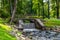 Small waterfall in the eco park of Latvia Riga