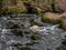 Small waterfall in the eco park of Latvia Riga