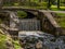 Small waterfall in the eco park of Latvia Riga