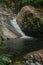 A small waterfall in the forest located in Mount Stong, Kelantan, Malaysia.