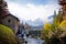 Small waterfall over wall on lake Laghi Fusine in autumn