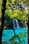 Small waterfall in Plitivce Lakes Nation Park in Croatia. Crystal clear turquoise water.