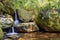 Small waterfall among the rainforest vegetation of Ilhabela island