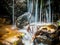 Small waterfall in Slovakia forest in autumn