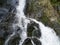 Small Waterfall in the Tropical Rainforest Mountains