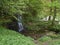 A small Waterfall tumbling off the hillside and into the Ceres Burn next to the Village Hall in Kemback.