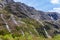 Small waterfalls and streams from sheer cliffs on the way to Fiordland. South Island, New Zealand