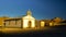 Small white church in bolivian mountain village