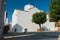 Small white church on a hill over Skopelos town at summer morning, island of Skopelos