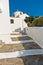 Small white church on a hill over Skopelos town at summer morning, island of Skopelos