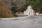 Small white church at island of Poros, Greece