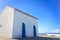 Small white church in portugal on a sunny day, blue sky, combination of white and blue, place of prayer