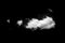 Small white compact cloud on a black background